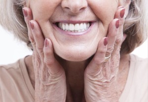 Senior woman with dentures - Fifth Avenue Endodontics